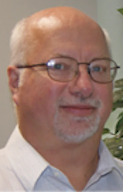 Roger Brauninger Headshot With Plant Background Fmt