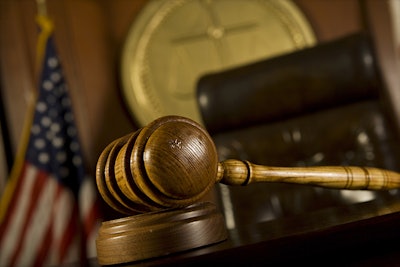 Gavel In Courtroom Dreamstime Credit Photographerlondon Resized