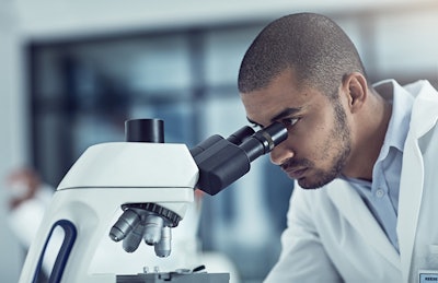 Looking Through Microscope I Stock Credit People Images Resized