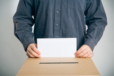 Man Casting Vote Dreamstime Credit Nullplus Resized