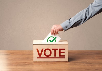 Putting Vote In Box Dreamstime Credit Ratz Attila Resized
