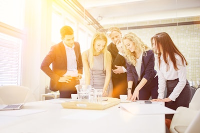 Business Team In Workshop Dreamstime Credit Robert Kneschke Resized