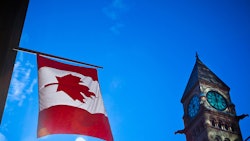 Canada Flag And Building Dreamstime Credit Aqnus Febriyant Resized