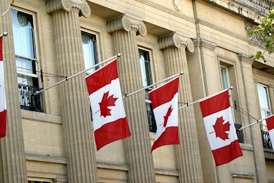 Canadian Flags On Building Dreamstime Credit Saphire Ovadia Resized