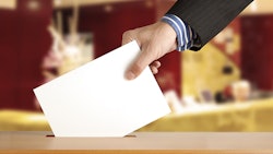 Hand Placing Vote In Box Dreamstime Credit Andrey Burmakin Resized