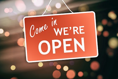Open Sign Hanging Dreamstime Credit Tzogia Kappatou Resized