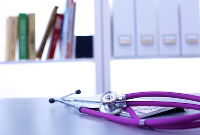 Stethoscope On Table Dreamstime Credit Nikolai Lenets Resized