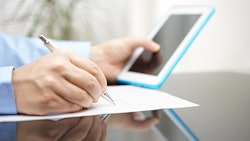 Businessman Filling Out App Adobe Stock Credit Bacho Foto Resized