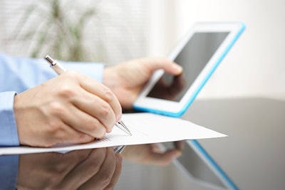 Businessman Filling Out App Adobe Stock Credit Bacho Foto Resized