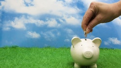 Hand Placing Coin In Piggy Bank Adobe Stock Credit Karen Roach Resized