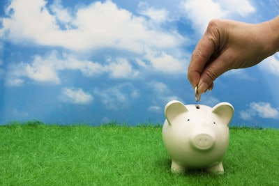 Hand Placing Coin In Piggy Bank Adobe Stock Credit Karen Roach Resized