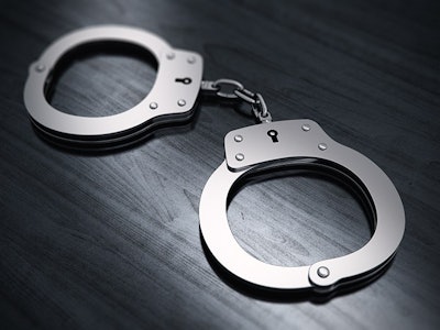Handcuffs On Table Adobe Stock Credit Scanrail Resized