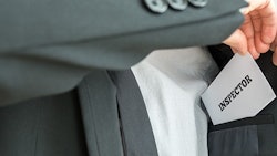 Inspector With Business Card Adobe Stock Credit Gajus Resized