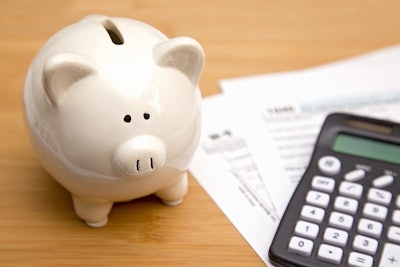 Piggy Bank And Calculator Adobe Stock Credit Pamela D Mcadams Resized