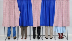 People In Voting Booths Adobe Stock Credit Stevecuk Resized