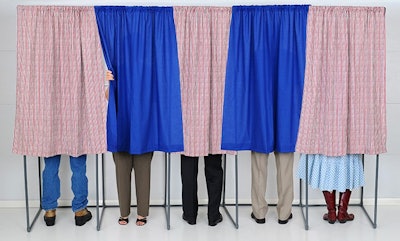 People In Voting Booths Adobe Stock Credit Stevecuk Resized