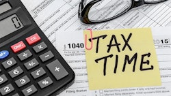 Tax Form With Calculator And Glasses Adobe Stock Credit Igorkol Ter Resized