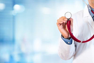 Doctor Holding Stethoscope Adobe Stock Credit Romolo Tavani Resized