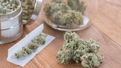 Marijuana In Jar Rolling Paper Adobe Stock Credit Capjah Resized