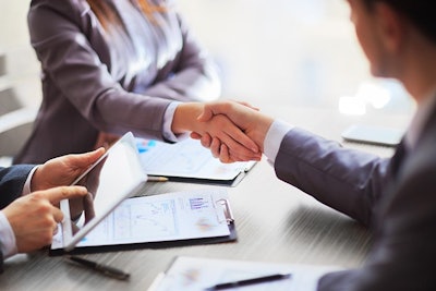 Business Woman Shaking Hands Adobe Stock Credit Yurolaitsalbert Resized