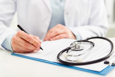 Doctor With Clipboard Adobe Stock Credit Stasique Resized