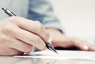 Signing Document Adobe Stock Credit Wrangler Resized