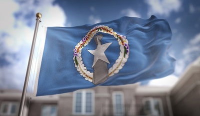 Northern Mariana Islands Flag And Building Adobe Stock Credit Natanaelginting Resized