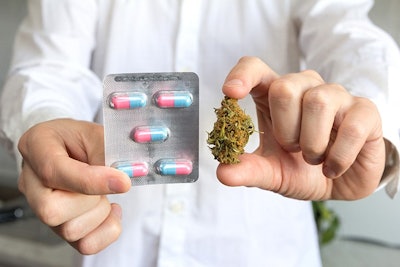 Doctor Holding Pills And Cannabis Adobe Stock Credit Eight8 Resized