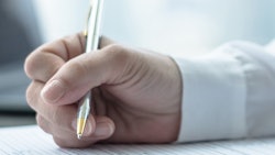 Supporting Story 2 Businessman Completing Form Adobe Stock Credit Chinnapong Resized
