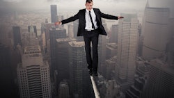 Walking Tightrope Adobe Stock Credit Chlorophylle Resized