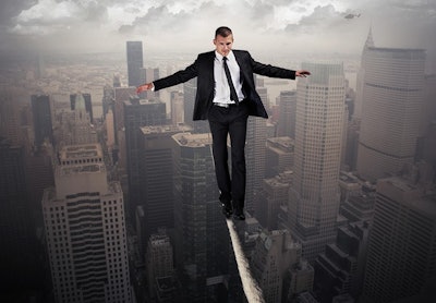 Walking Tightrope Adobe Stock Credit Chlorophylle Resized