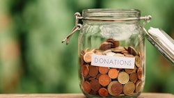 Charity Donations In Jar Adobe Stock Credit Lemontreeimages Resized