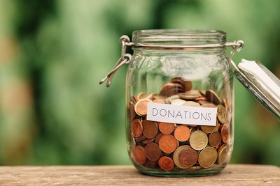 Charity Donations In Jar Adobe Stock Credit Lemontreeimages Resized