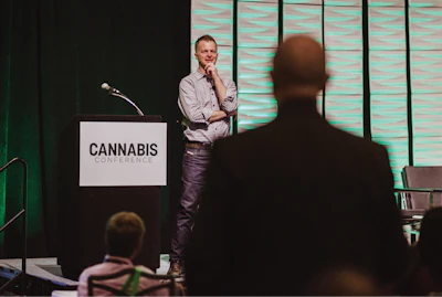 Attendees asked questions at the end of the Welcome Keynote by John Cochran, COO of Harvest Health & Recreation. Cochran is the former CEO of Pabst Brewing Company, and former president and COO of Fiji Water Company. Photo by Jake Gravbrot