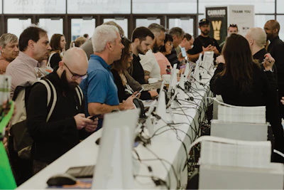 Attendees picking up their badges at the registration desk in the Westgate Resort & Casino. Photo by Jake Gravbrot