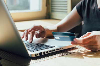 Making Purchase On Internet Computer Credit Card Adobe Stock Credit Kkolosov Resized