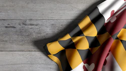 Maryland Flag On Table Adobe Stock Credit Erllre Resized