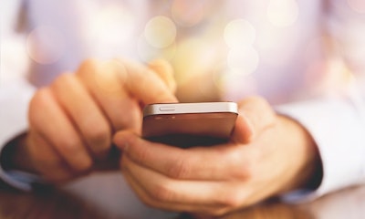 Man Using Cell Phone Adobe Stock Credit Billion Photoscom Resized