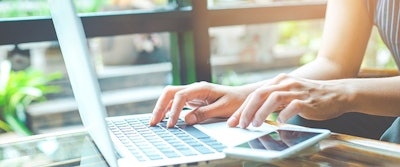 Woman With Laptop Adobe Stock Credit Apichon Tee Resized