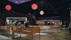 Planet 13's dispensary includes features that appeal to tourists, such as the glowing orbs suspended from the ceiling that move to music periodically during store hours.