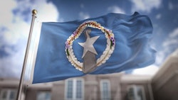 Northern Mariana Islands Flagand Building Adobe Stock Credit Natanaelginting Resized