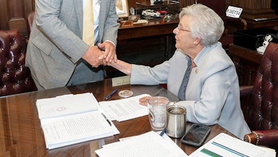 Alabama Gov. Kay Ivey signs medical cannabis legislation Monday afternoon.