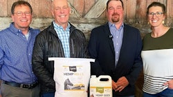 Fort Benton-based IND HEMP CEO Ken Elliott, from left, Montana Gov. Greg Gianforte, state Rep. Josh Kassmier and IND HEMP Chief Operating Officer Morgan Elliott gather with Montana produced equine hempseed products following the April 11 signing of House Bill 396, which authorizes hemp as commercial animal feed.