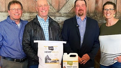 Fort Benton-based IND HEMP CEO Ken Elliott, from left, Montana Gov. Greg Gianforte, state Rep. Josh Kassmier and IND HEMP Chief Operating Officer Morgan Elliott gather with Montana produced equine hempseed products following the April 11 signing of House Bill 396, which authorizes hemp as commercial animal feed.