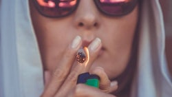 Young Woman Smoking Cannabis736x491