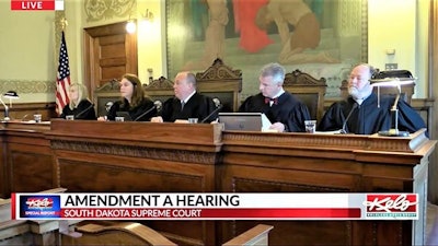 South Dakota Supreme Court Justices Patricia J. DeVaney, from left, Janine M. Kern, Steven R. Jensen, Mark E. Salter and Scott P. Myren hear April 28 arguments about the constitutionality of voter-approved Amendment A, which would legalize adult-use cannabis in the state. They have yet to issue an opinion.