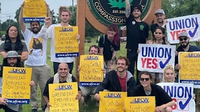 After an employee termination, unionized cannabis dispensary workers hold a one-day strike June 26 at the Greenleaf Compassionate Care Center in Portsmouth, R.I.