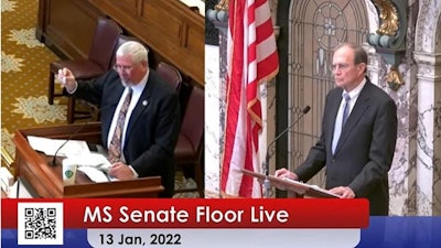 Mississippi state Sen. Kevin Blackwell holds up a joint (of hemp) during floor debate on his medical cannabis bill Jan. 13.