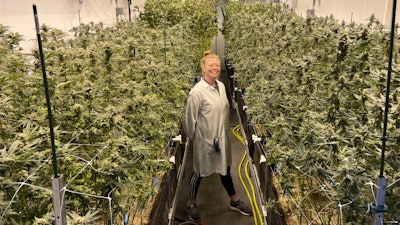Sarah Wright, Head Cultivator at MOCA Humboldt, alongside Wookies and Grape Cookies.
