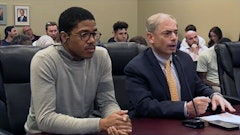 Curaleaf’s director of corporate social responsibility, Raheem Uqdah, and chief compliance officer, James Shorris, sit before the New Jersey Cannabis Regulatory Commission board April 13 in Trenton.